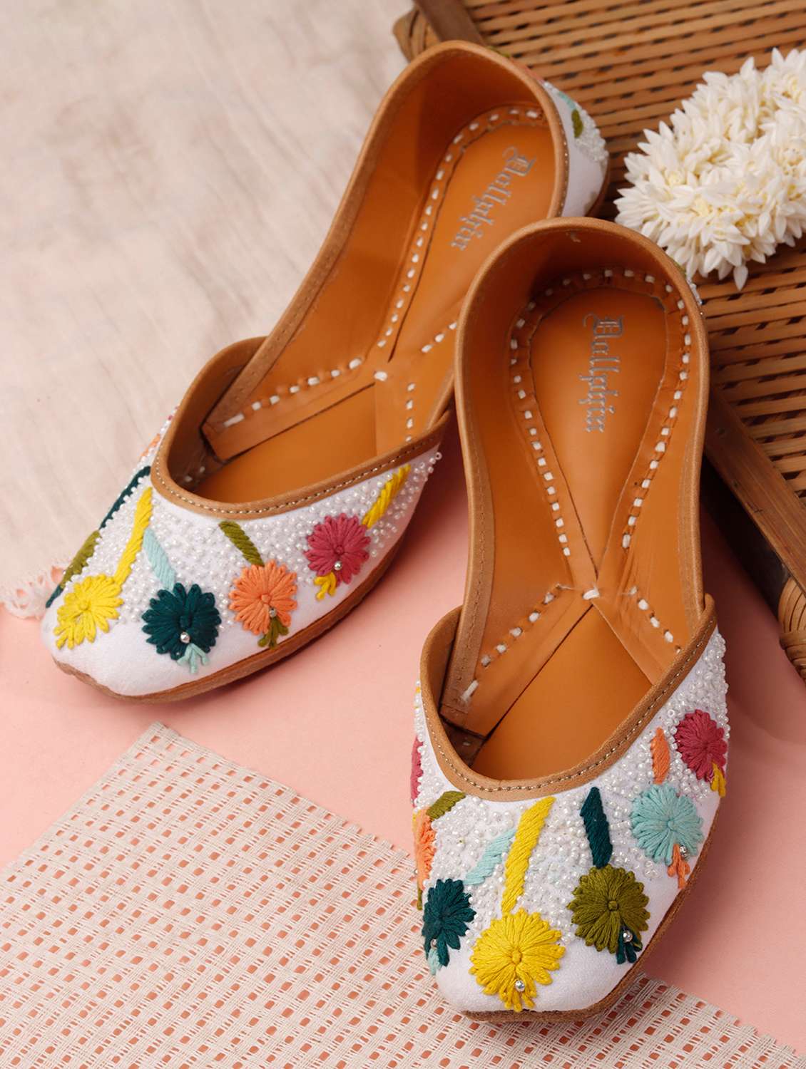 women embroidered slip on jutis