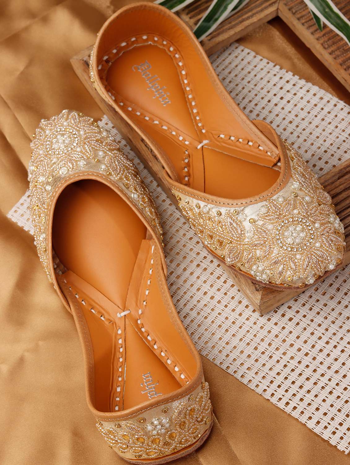 women embroidered slip on jutis