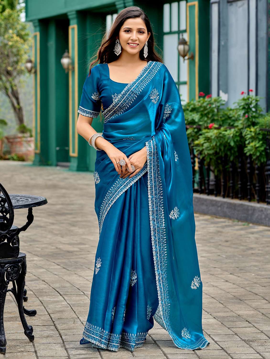 women solid with work embroidered saree with blouse