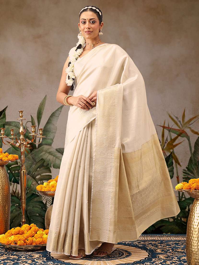 women solid with bordered kasavu saree with blouse