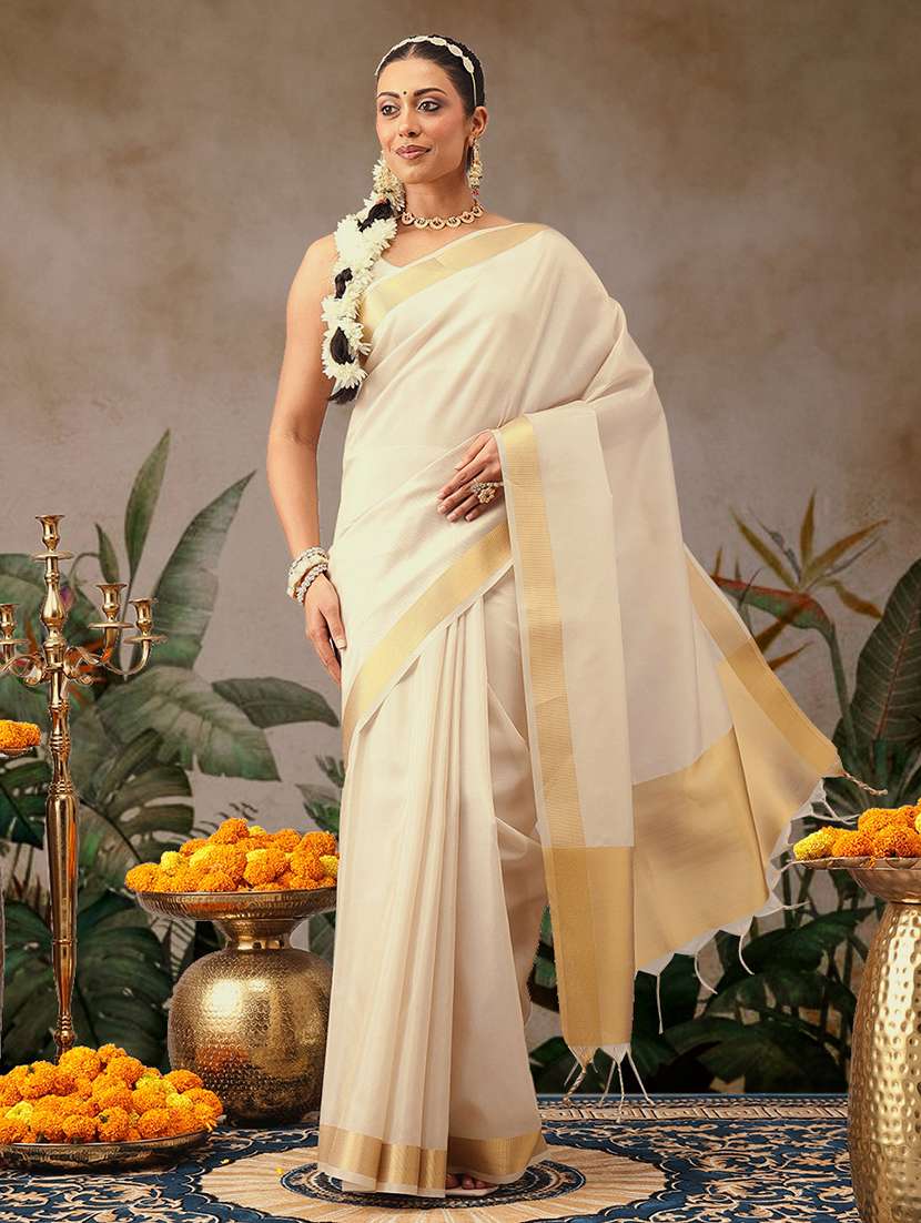 women solid with bordered kasavu saree with blouse