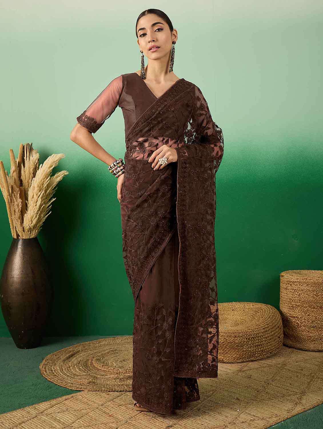 women solid with work embroidered saree with blouse