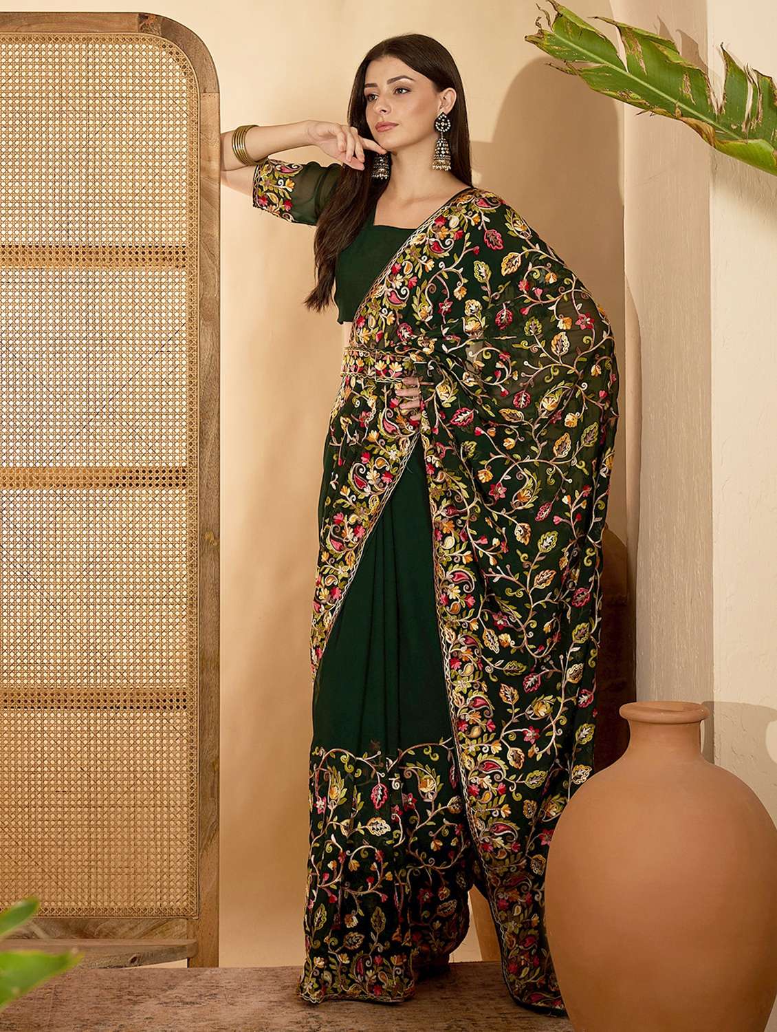 women solid with work embroidered saree with blouse