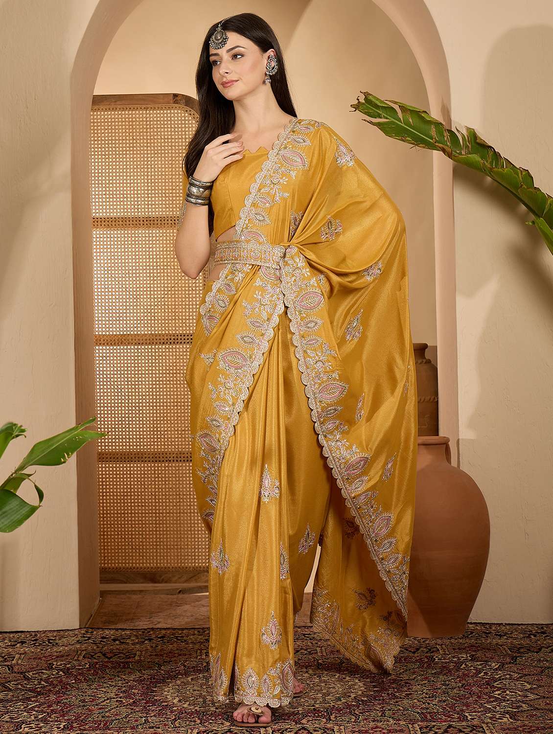 women solid with work embroidered saree with blouse
