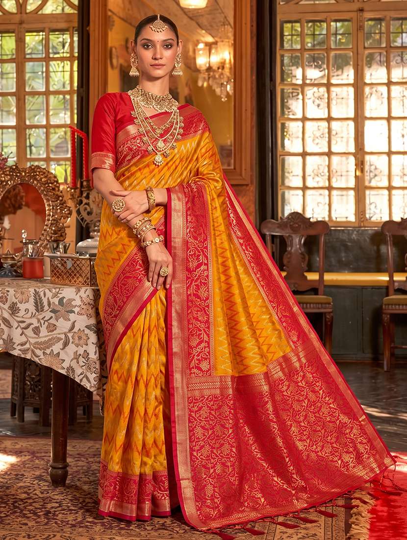 women self design banarasi saree with blouse