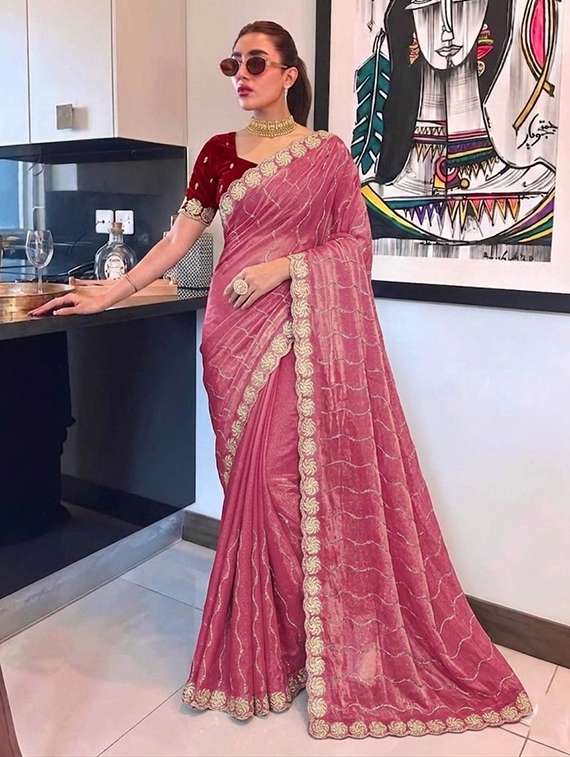 women solid with work embroidered saree with blouse