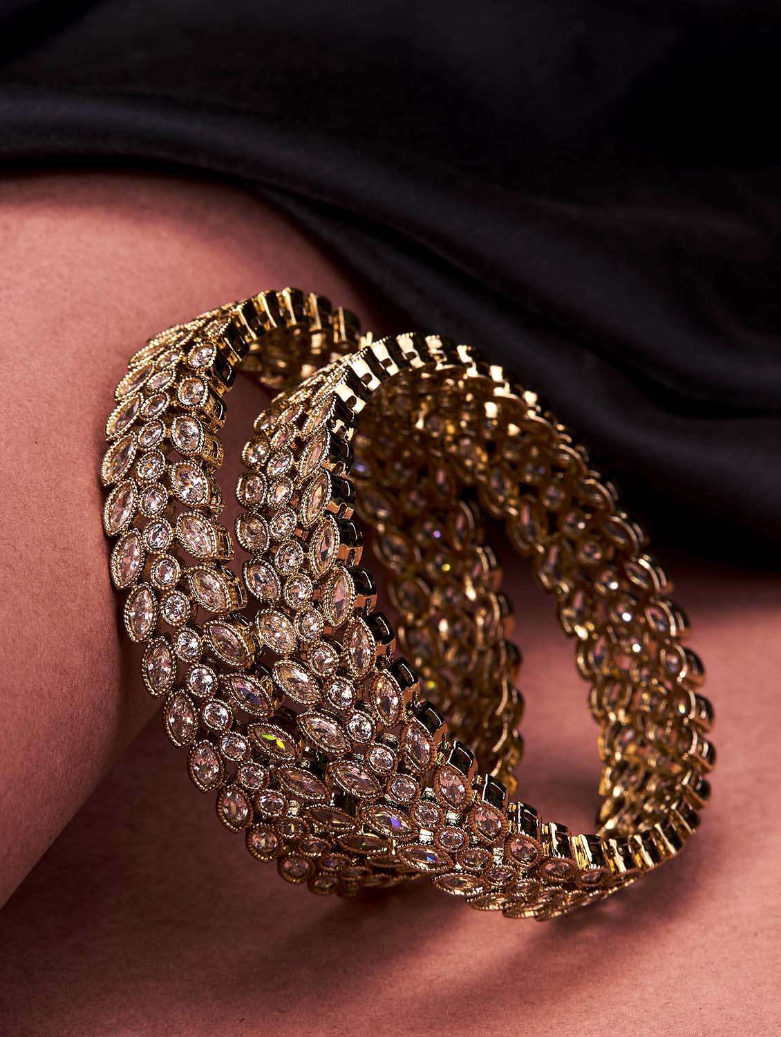 women circular leaflet rhodium plated bangles set