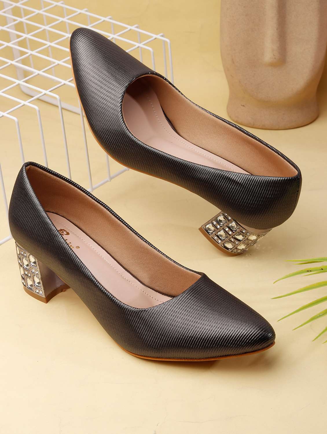 women embellished slip on pumps