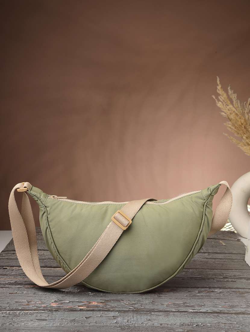 women solid sling bag with adjustable strap
