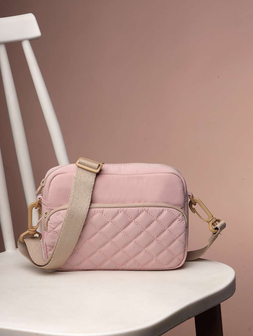 women textured sling bag with adjustable strap