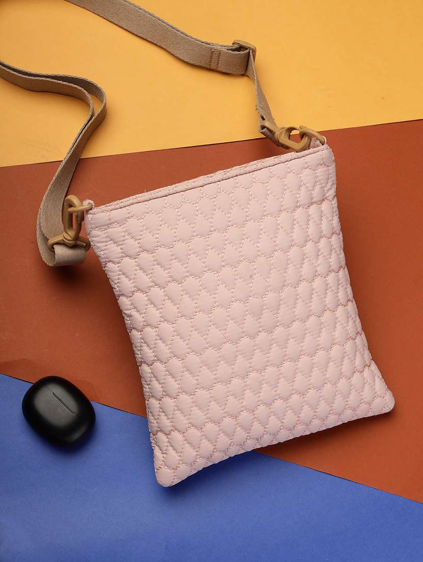 women textured sling bag with adjustable strap