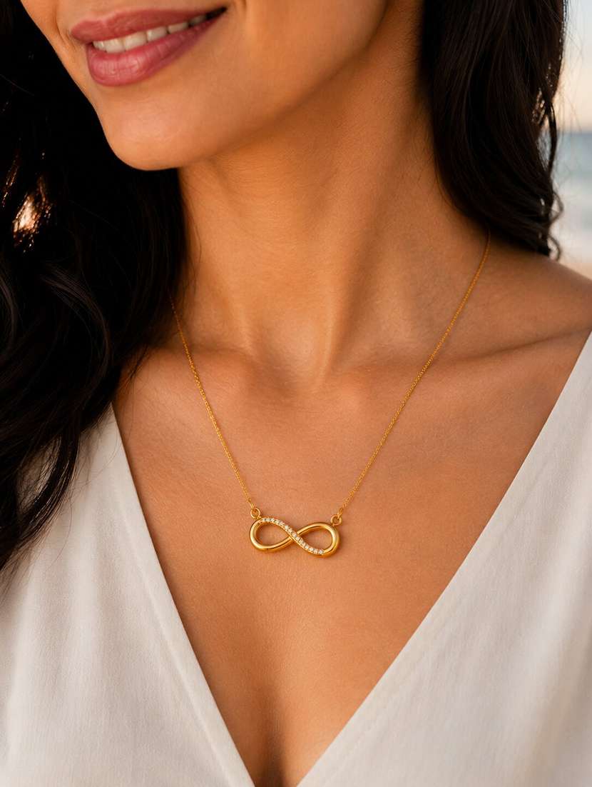 Elegant Infinity Pendant Necklace With Sparkling Cz Stone Detail - 22658485 -  Standard Image - 2