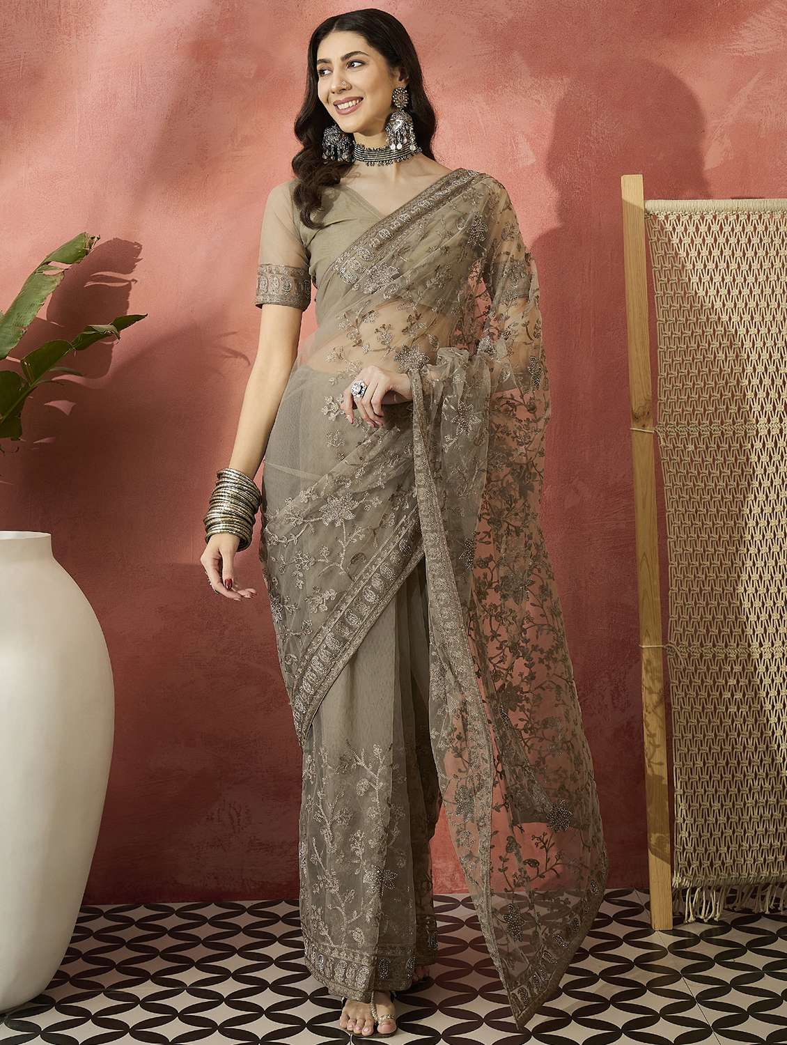 women solid with work embroidered saree with blouse