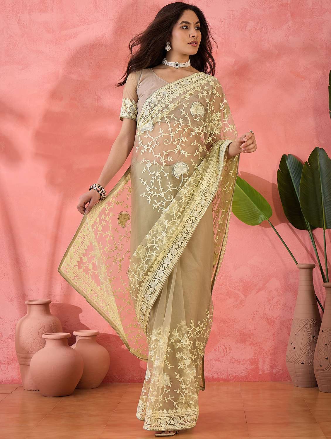 women solid with work embroidered saree with blouse