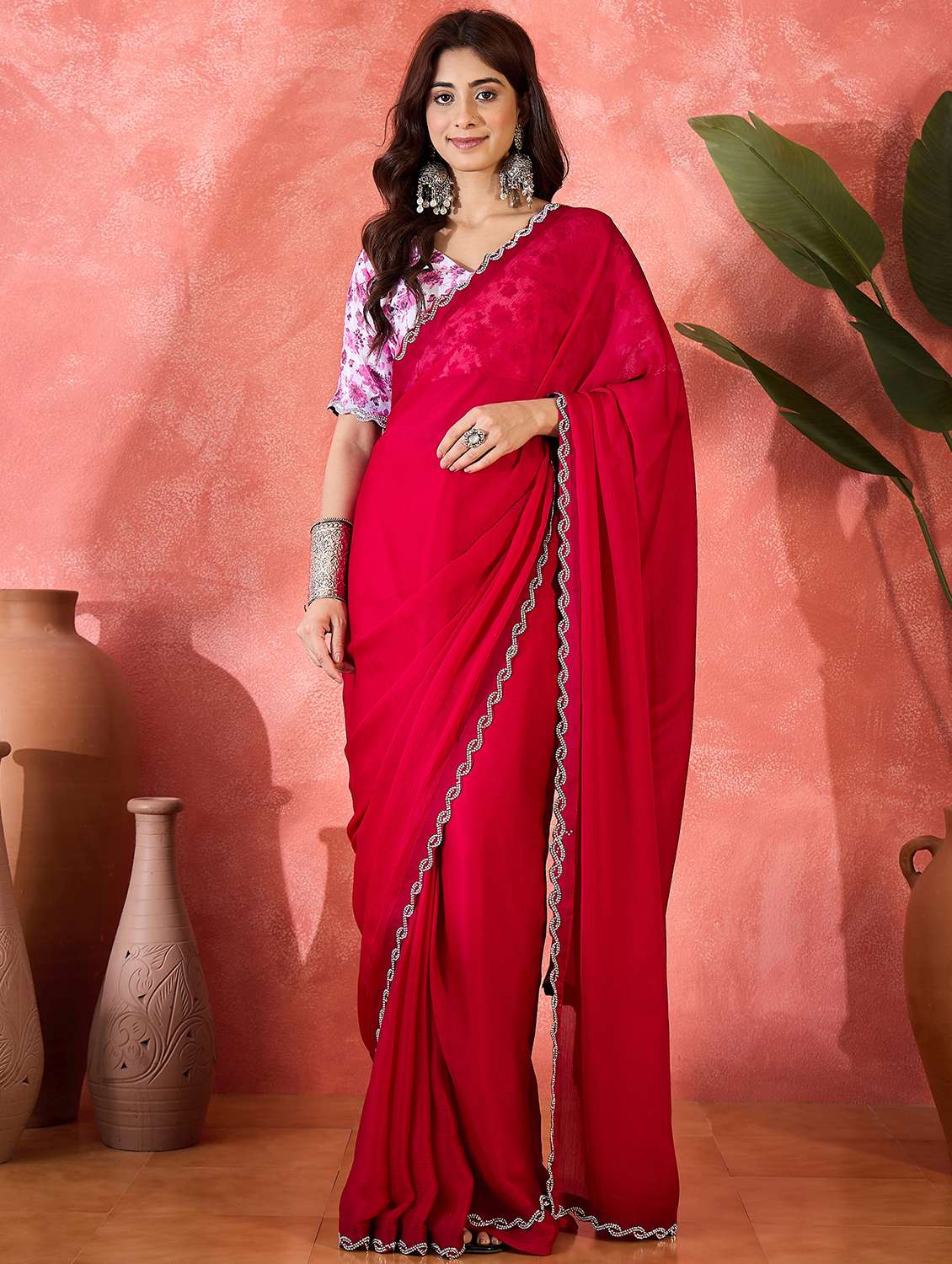 women solid with embellished bordered saree with blouse