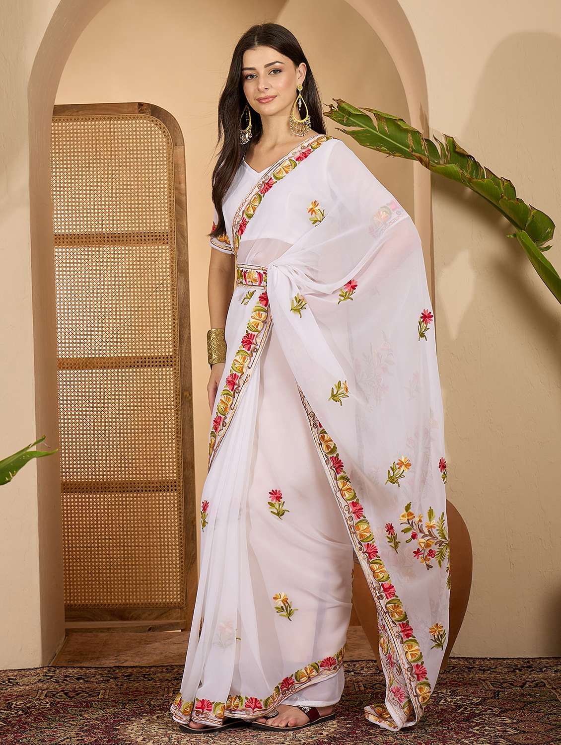 women solid with work embroidered saree with blouse