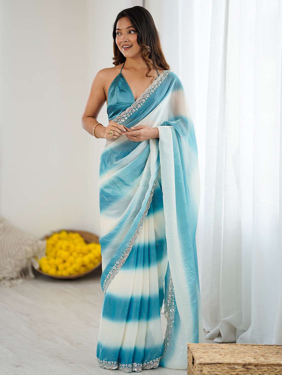 women tie & dye printed embellished saree with blouse