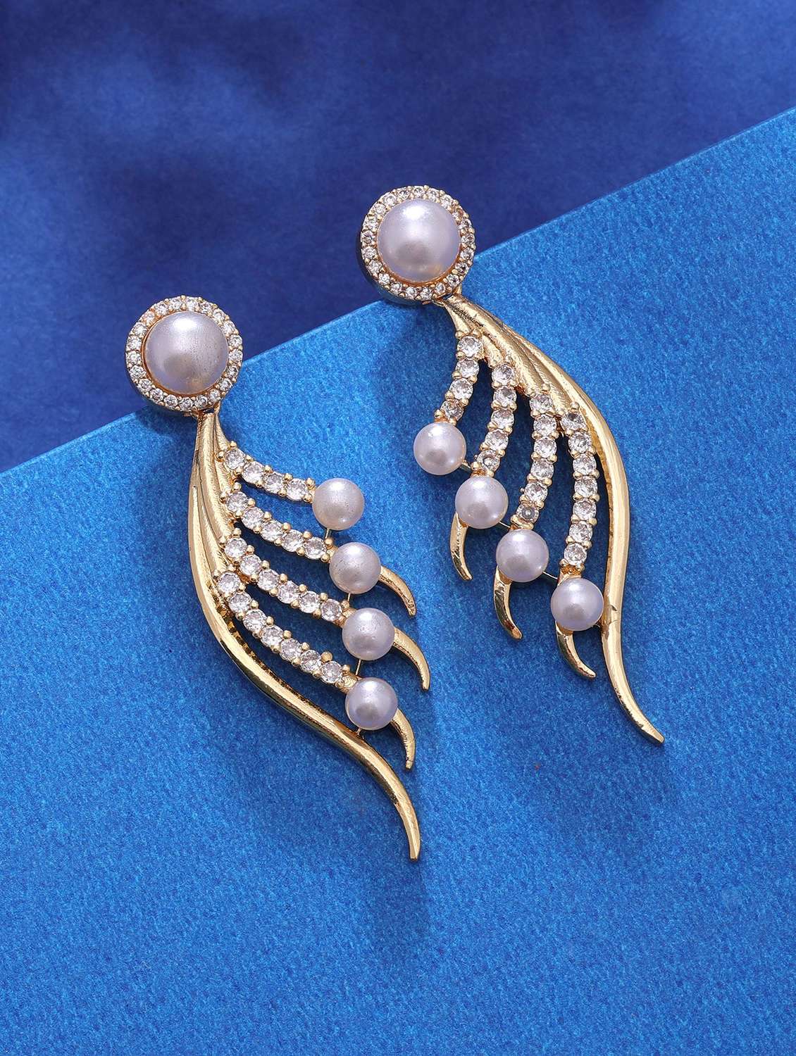 women gold drop pearls and diamonds drop earrings