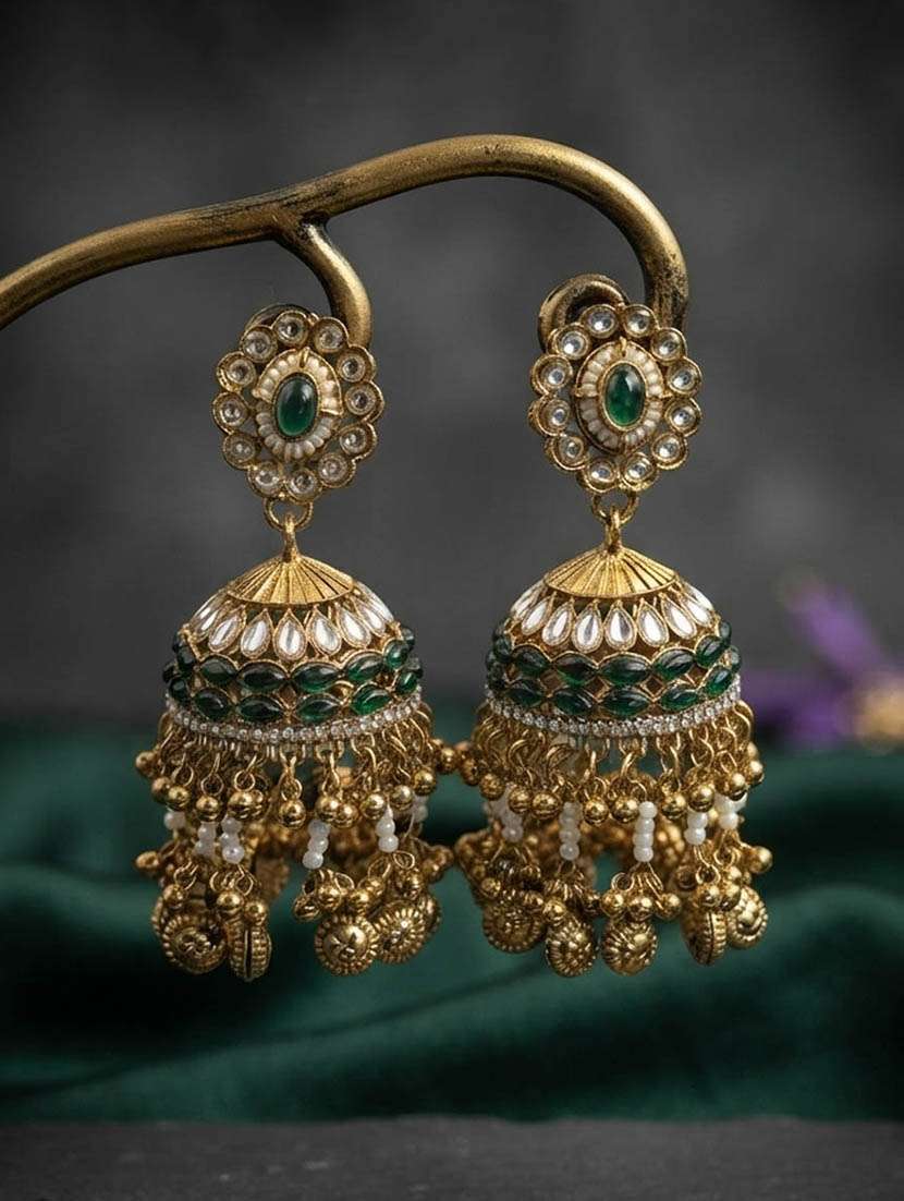 women kundan and stones jhumka
