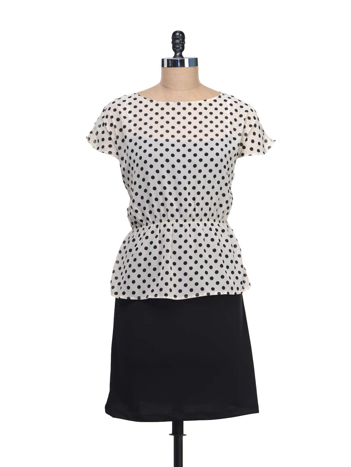 polka dotted peplum dress