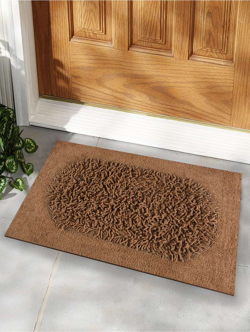 dark beige scrambled oval bath rug