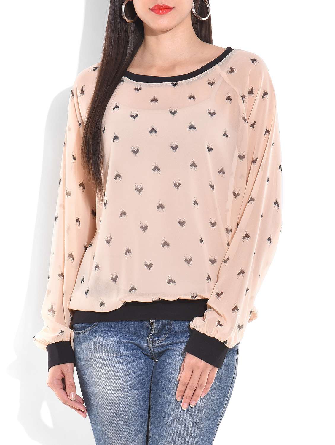 peach printed top with ribbed cuffs